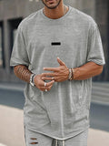 Athleisure T-Shirt- und Shorts-Set in lockerer Passform