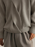 Stylischer Strickpullover mit Twist-Design