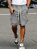 Einzigartige Baumwoll-Cargo-Shorts mit mehreren Taschen und Kordelzug