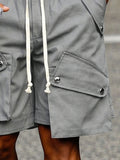 Einzigartige Baumwoll-Cargo-Shorts mit mehreren Taschen und Kordelzug