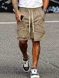 Einzigartige Baumwoll-Cargo-Shorts mit mehreren Taschen und Kordelzug