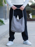 Weiche Schultertasche aus Tweed und Canvas