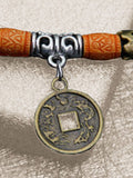 Accessoire mit künstlichen Türkisperlen und Münzanhänger
