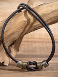 Vintage Choker-Halskette mit Lederknoten und Perlen