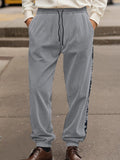 Stylische Cord-Jogginghose mit seitlichem Paisley-Muster