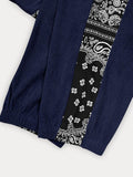 Stylische Cord-Jogginghose mit seitlichem Paisley-Muster