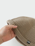 Modische warme Strick-Beanie