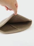 Modische warme Strick-Beanie