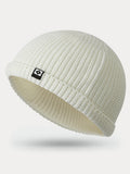 Modische warme Strick-Beanie