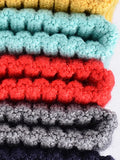Minimalistische Strickmütze mit Umschlag